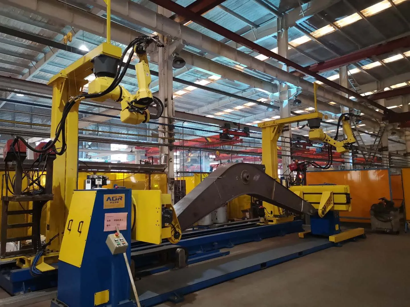 Dual-Robot Coordinated Welding Cell for Excavator Booms