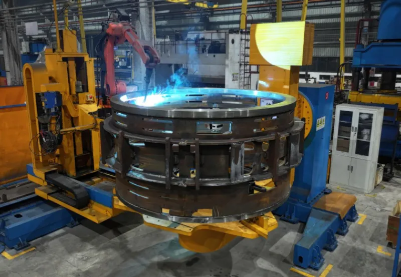 Multi-axis servo positioner with dual-arm robotic welding setup