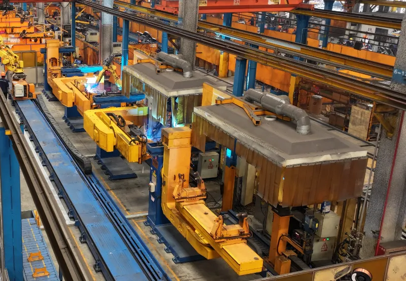 Automated robotic welding line for excavator booms and arms