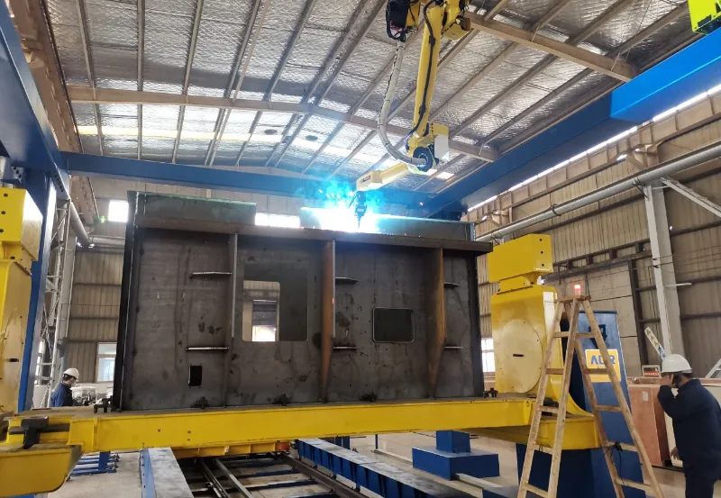 Servo positioner alignment in automated elevator tail welding line