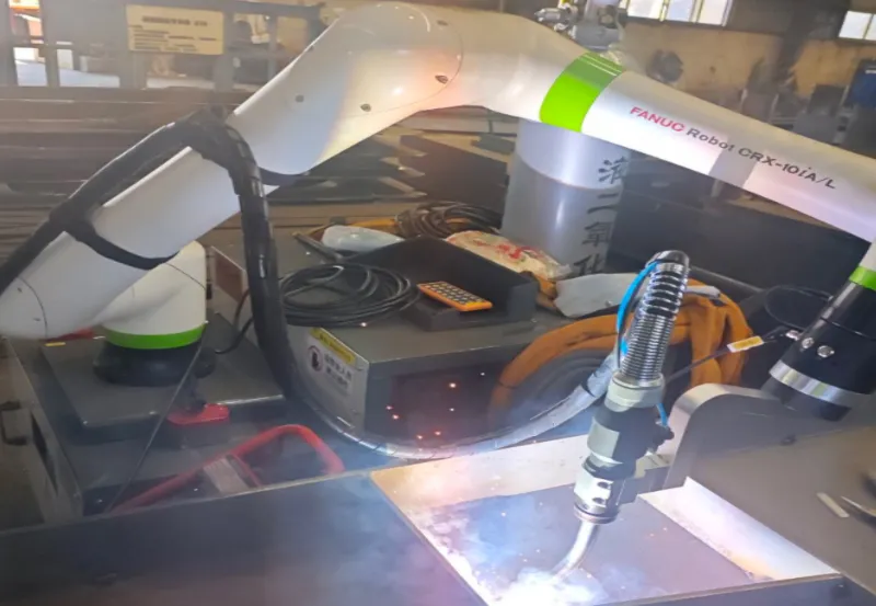 Mobile cobot welding system with quick-positioning cart