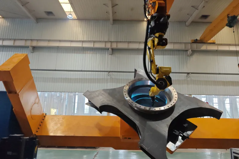 industrial robotic welding cell for heavy equipment chassis